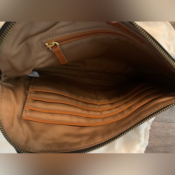 HOBO- sable wristlet in black polished leather. 
Measurements-10 x 6. Brand new - Picture 6 of 6